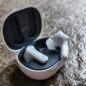 One of the Creative Zen Air buds out of its case